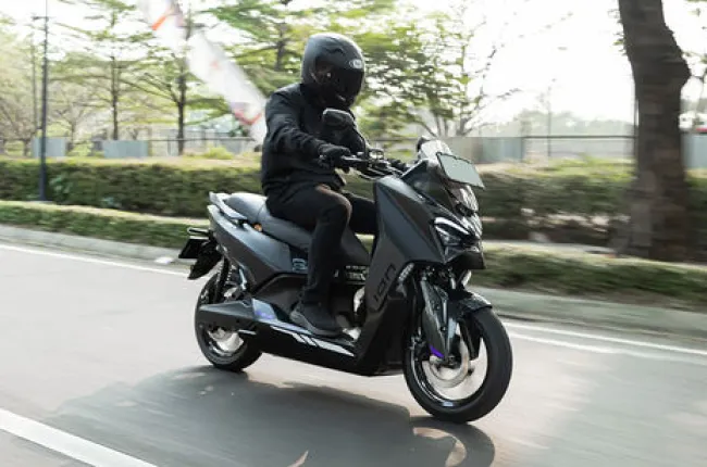 M1-S Electric Maxi-Scooter Riding: Front Right Quarter View