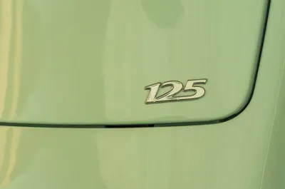 125 Model Badge